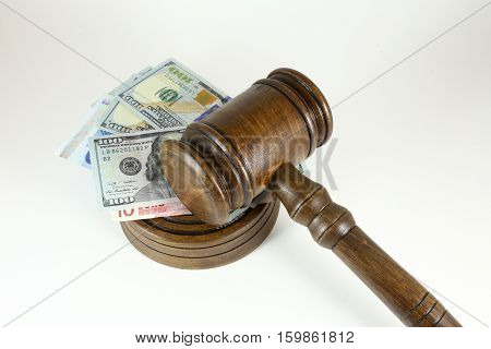 auction hammer , symbol of authority and money.