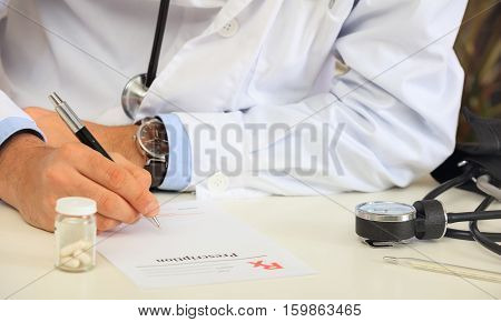 Doctor Writing A Perscription