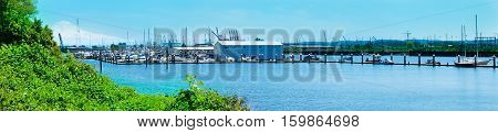 Tacoma Port With Cranes And Boats.