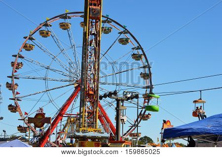 carnival fair blue sky ride midway Ferris wheel