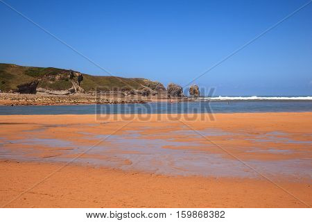 LIENCRES DUNES SPAIN - AUGUST 21: View of the Liencres dunes nature reserve in the Cantabrian sea on August 21 2016