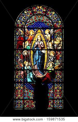 Poitiers France - September 12 2016: Colorful stained glass window in the Church of St. Radegund at Poitiers in France