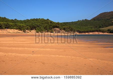 LIENCRES DUNES SPAIN - AUGUST 21: View of the Liencres dunes nature reserve in the Cantabrian sea on August 21 2016