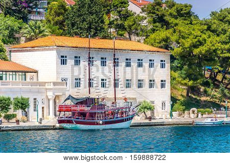 Waterfront view at stonemasonry school in small town Pucisca, Croatia Europe.