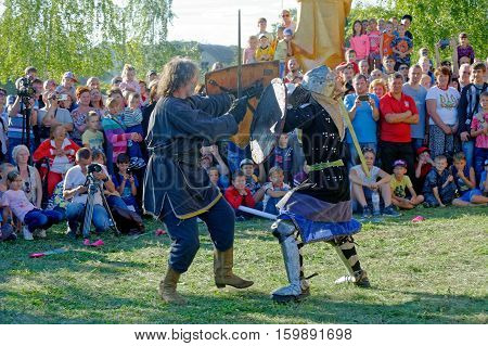 Kharkiv Ukraine - September 10 2016: Reconstruction of a medieval duel with swords during the ethnographic festival in Kharkiv region