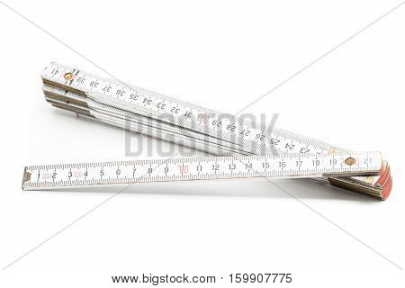 Folding rule with centimeter scale on white background