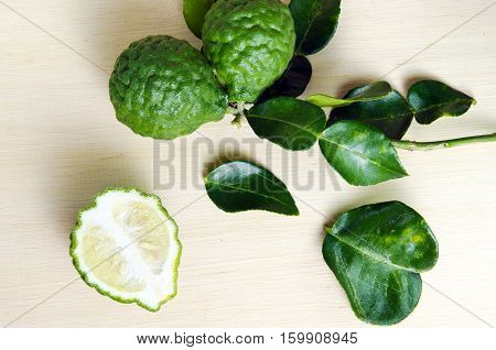 Bergamot Fruit With Leaf On Wooden Board