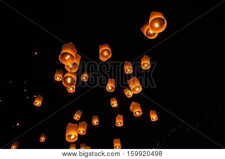 Floating lanterns ceremony or Yee Peng ceremony, traditional Lanna Buddhist ceremony in Chiang Mai, Thailand