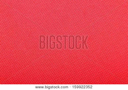 Close up of red textured synthetical background