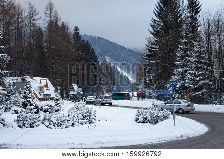 POLAND ZAKOPANE - JANUARY 05 2015: Rondo of the Pope John Paul II in center of Zakopane. Town known as the winter capital of Poland. It is a popular destination for mountaineering and skiing.