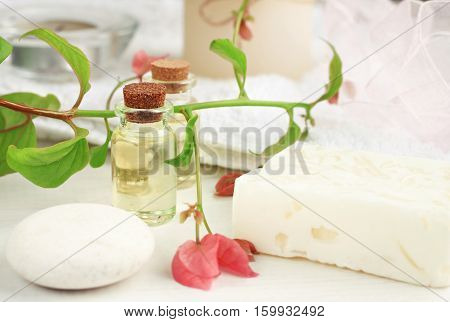 Plant-based cosmetic with tropical blossom relaxation set. Herbal skincare beauty treatment. Essential oil, fresh flower. Feminine toiletries.