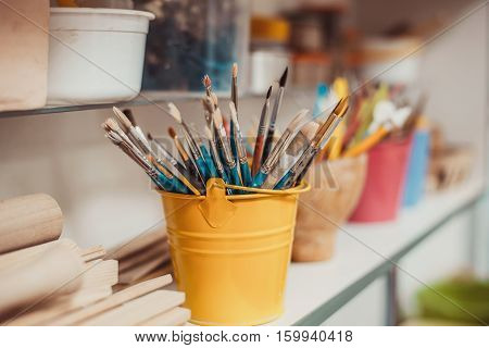 tool in pottery. Detail from pottery work room - brushes and tools