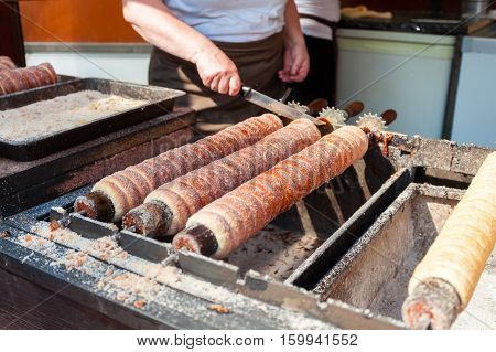 Trdelnik bakery on the street market in Prague, Czech Republic. Czech sweetness