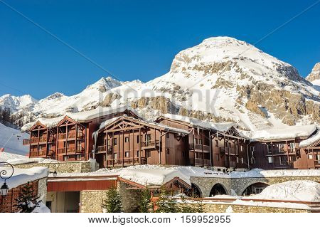 Alpine winter mountain landscape. French Alps covered with snow in sunny day. Val-d'Isere, France