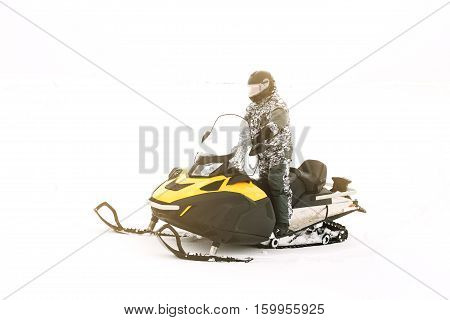 Man on snowmobile. Recreation concept on nature in winter holidays. Winter sports.