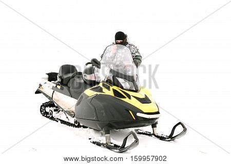 Man on snowmobile. Recreation concept on nature in winter holidays. Winter sports.