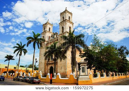 Valladolid, Mexico. Cathedral de San Servasio during the day in Valladolid the city in Yucatan, Mexico. Cloudy sky