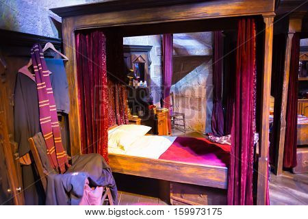 Leavesden, London, UK - 1 March 2016: Interior of student's bedroom. Harry Potter's bed. Decoration Warner Brothers Studio
