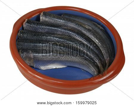 fishes herrings with lemon on a plate