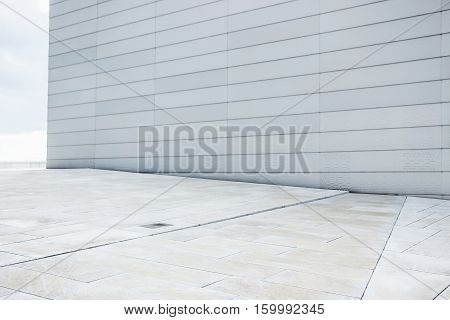 brick wall and tile floor on rooftop at oslo opera house