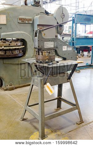 DAYTON, OHIO, USA - NOVEMBER 18, 2016: A Rotex hand turret punch in the Restoration Hanger of the National Museum USAF is used in metalwork to restore aircraft & related items.  