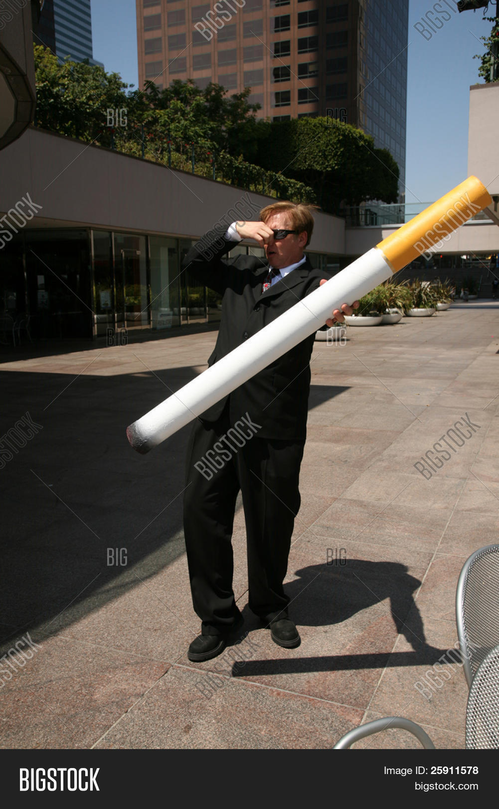 comically large cigarette Anti-Smoking Concepts Image & Photo (Free Trial)