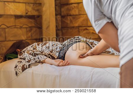 Total Relaxation. Beautiful Young Wwoman Get Balinese Or Thai Massage