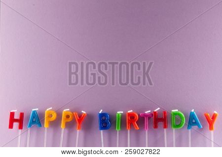 Many Colored Candles With Text Happy Birthday