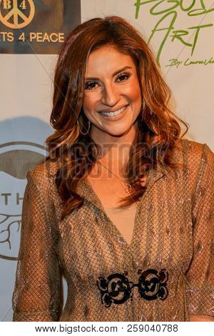 Anneliese van der Pol arrives at the The Art Of Social Media EMMY Gifting Lounge at the Waldorf Astoria Hotel, Beverly Hills, CA on Sept. 15, 2018.