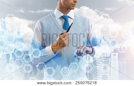 Double Exposure Of Confident And Young Businessman In Smart-casual Wear Smoking Pipe And Modern City