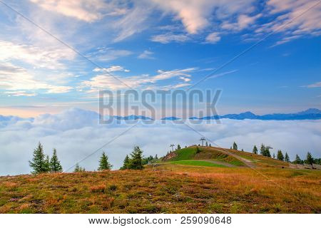 Amazing Morning In Carnic Apls In Austria.inverse Weather And View Of The Mountains In Slovenia.