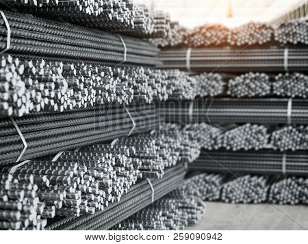 Reinforcement bars stacks. Metal products in metallurgical plant or warehouse. Industriall concept. 3d illustration