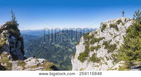 View To Cross On Summit Of Mountain Hochlantsch And Mountain Rennfeld In Styria, Austria