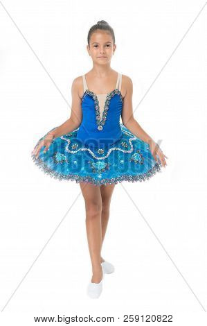 Little Girl In Ballet Position. Little Ballerina In Blue Tutu. Adorable Ballerina Girl Take Dance Le