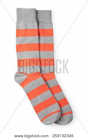 Two Striped Orange And Gray Socks Isolated On White Background