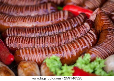 Delicious Grilled Sausages And Vegetable. Delicious Food.