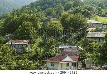 Dilijan, Armenia, August 24, 2018:view Of The Mountains Covered With Forest And The Chapel Of St. Sa