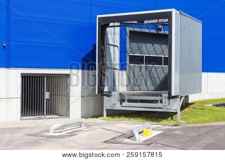 Loading Dock At A Warehouse. Modern Logistics Center. Docking Stations Of A Distribution Center.