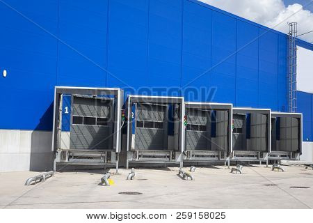 Loading Dock At A Warehouse. Modern Logistics Center. Docking Stations Of A Distribution Center.