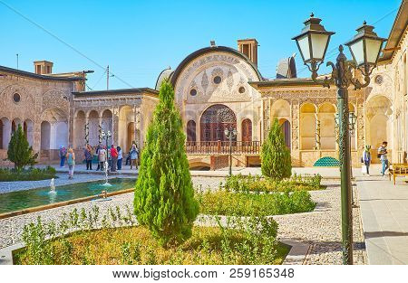 Kashan, Iran - October 22, 2017: The Small Garden Of Tabatabaei House With Young Thuja Trees, Octago
