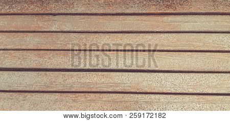 Drops Of Rain On Wooden Background. Wet Bench