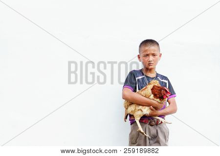 Phop Phra,tak/thailand - September 19:an Unidentified Boy In The Upper Body Was Carrying A Brown Chi