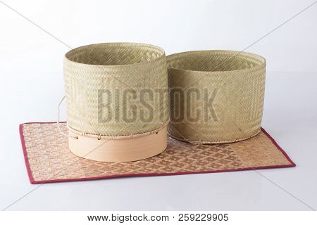 A Wicker Bamboo Box For Sticky Rice Keeping On Bamboo Mat