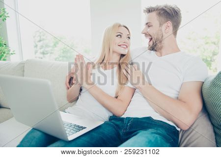 Beautiful Lovely Nice Cute Adorable Dreamy Stylish Trendy Couple In Hotel, Sitting On Sofa, Browsing