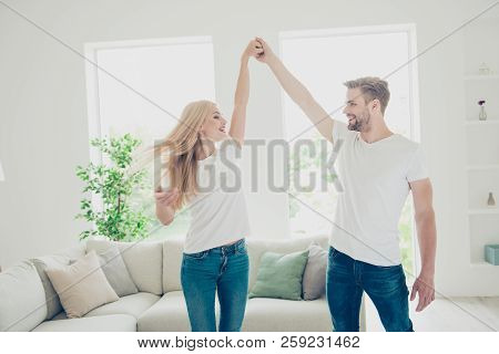 Beautiful Attractive Charming Cute Nice Adorable Playful Cheerful Couple In White T-shirts And Jeans