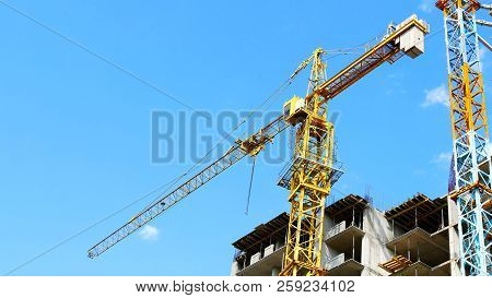 Industrial Crane. Construction Crane. Construction Site Background..