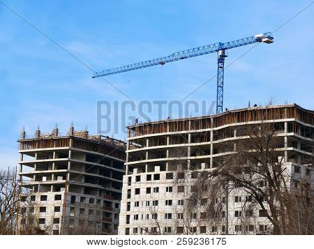 Construction Site Background. Commercial Construction Project. Crane Near Building