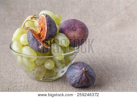 Fig And Grepe Fruits In Glass Dish