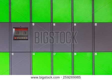 Outdoor Green Automated Public Lockers With Touchscreen Display. Autonomous Post Parcel Terminal.sel