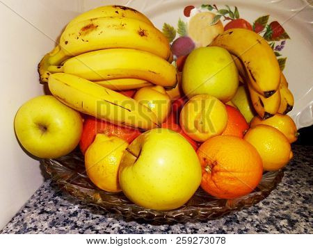 Bodegon Of Oranges, Apples, Bananas And Lemons